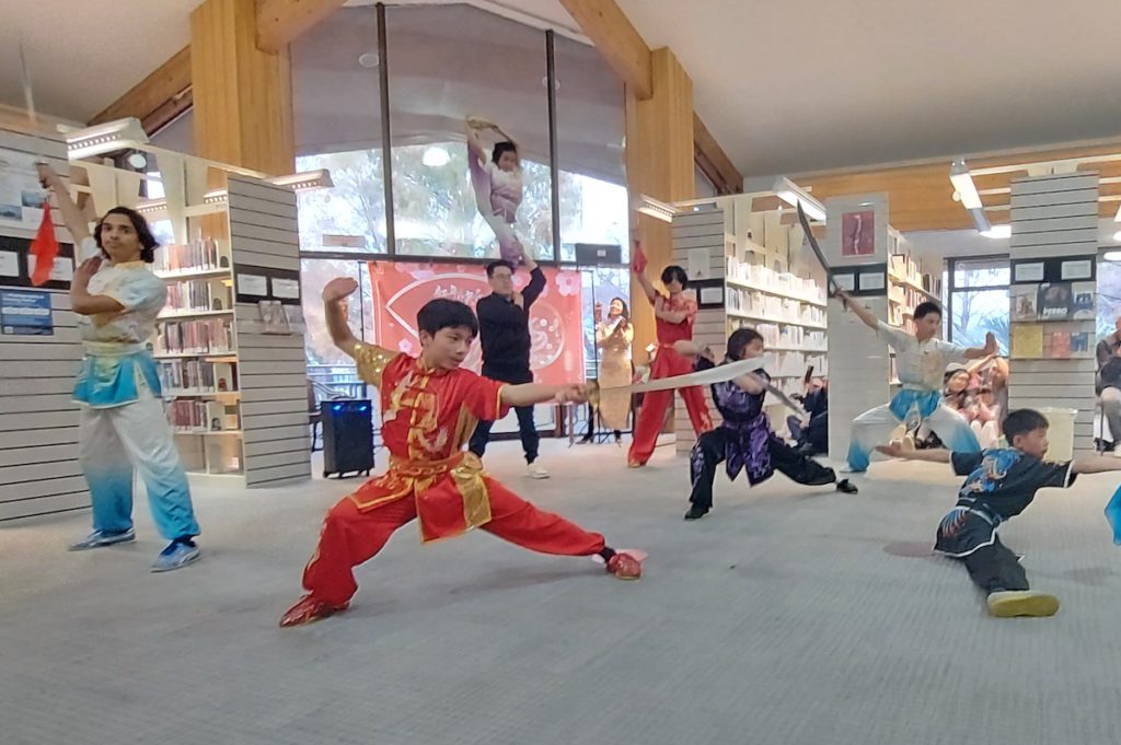 James Logan High School Kung Fu Club and Zhang Kung Fu Institute performed acrobatics and weapons demonstrations. Photo credit: Monika Lee
