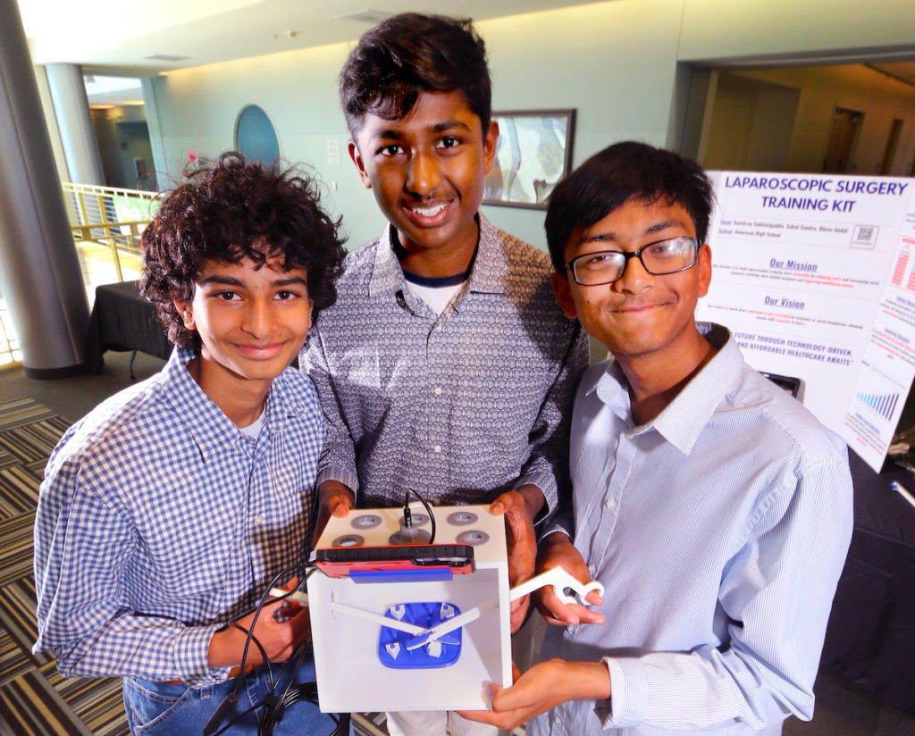 First-place winners Saket Sandru, Sanshray Vakkalagadda and Dhruv Jindal show off their laparoscopic training kit. Victor Carvellas