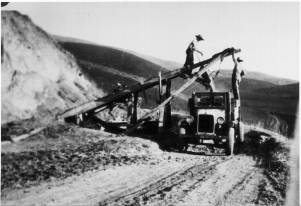 Henry Curtner used gravel from the quarry located at the end of Scott Creek Road to cover the miles of roads cut to traverse his property. The men in this picture are loading a truck using a conveyor system. Photo courtesy of Washington Township Museum of Local History
