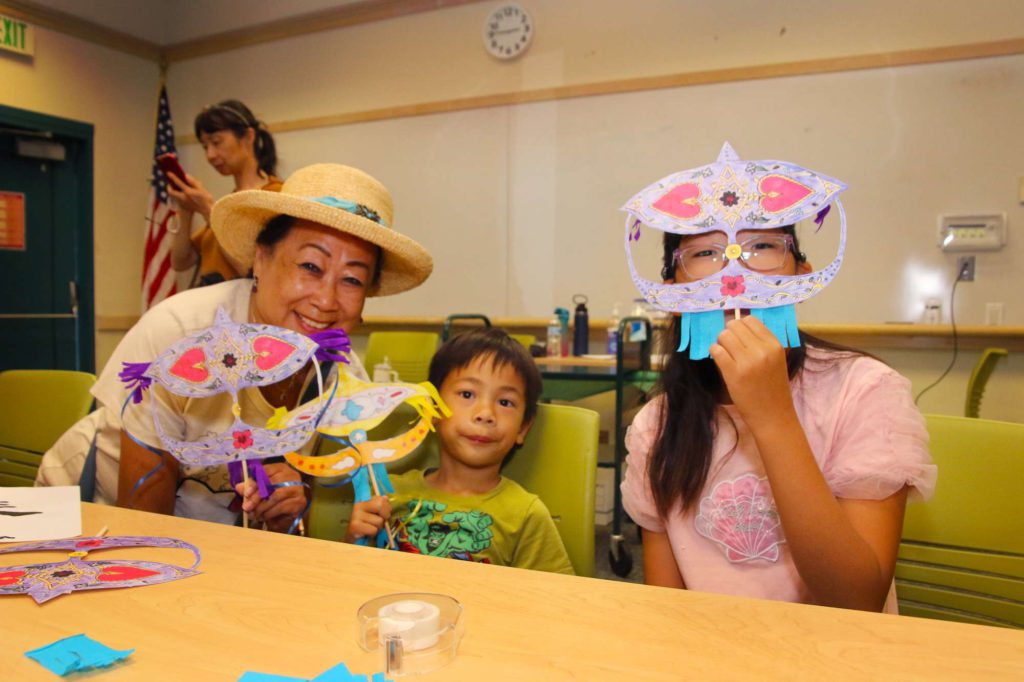 Attendees made—and tried on—Malaysian masks. Victor Carvellas